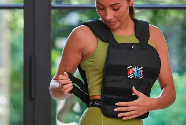 Woman using weighted outfit