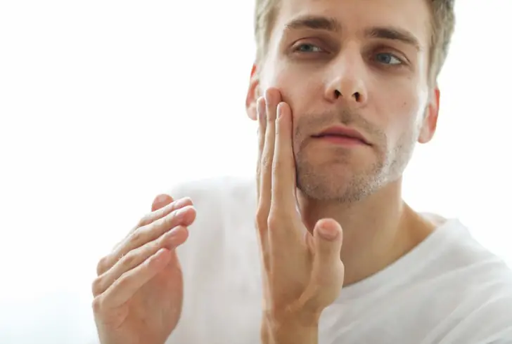 Dry skin is characterized by flakiness, itchiness, and roughness